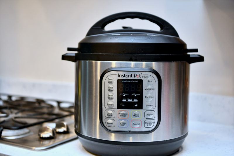 An INstant Pot on a stovetop