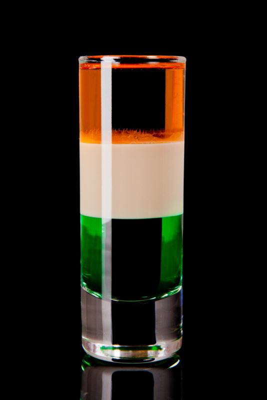 An Irish Flag Shooter isolated on black