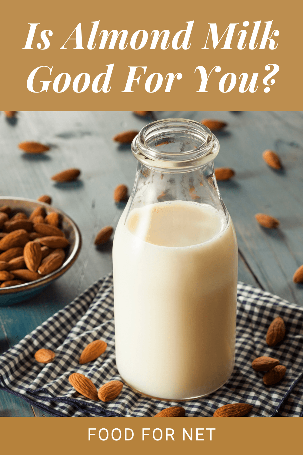 Is Almond Milk Good For You? A glass bottle of almond milk on a table with almonds scattered around