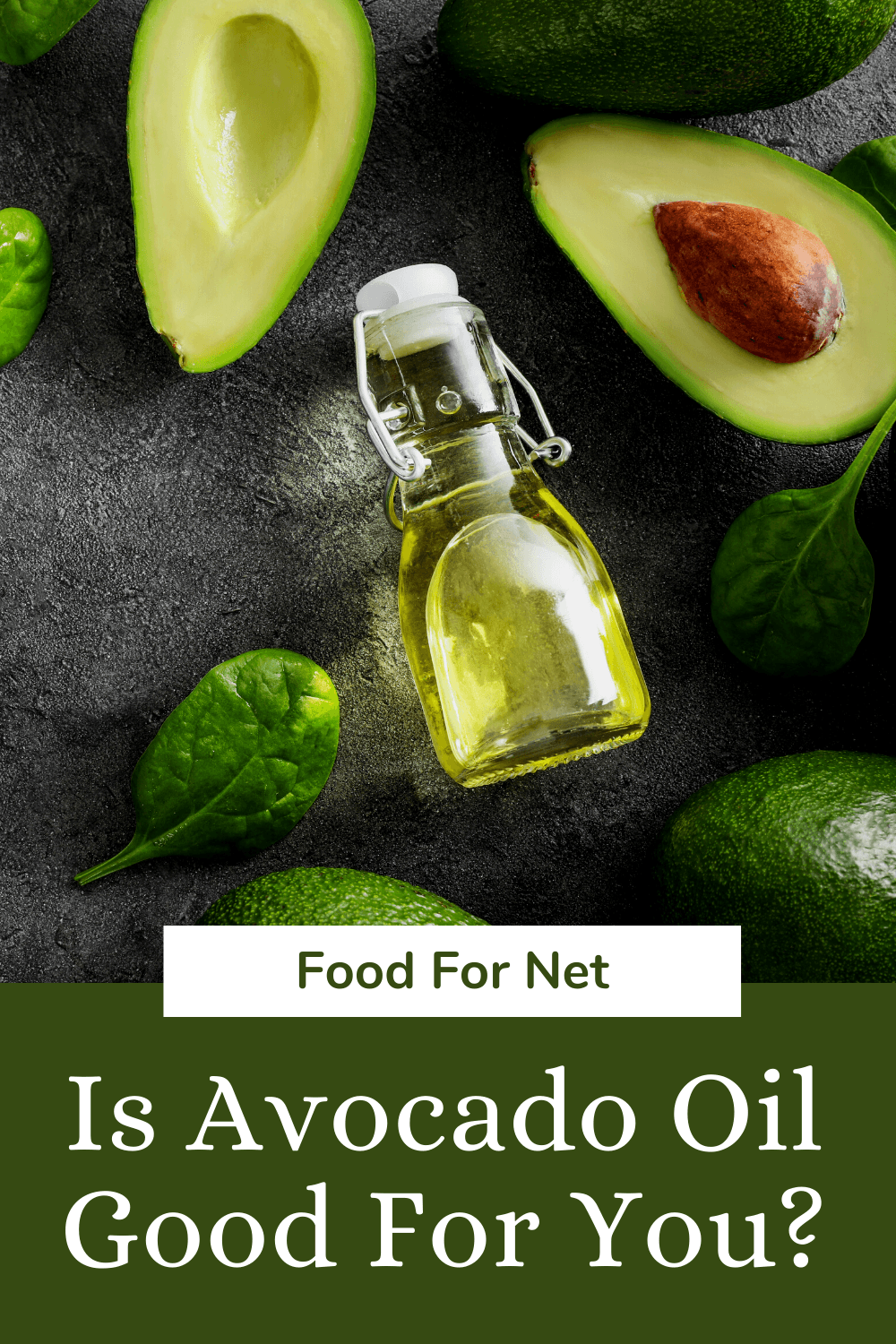 Avocados on a table with a small bottle of avocado oil