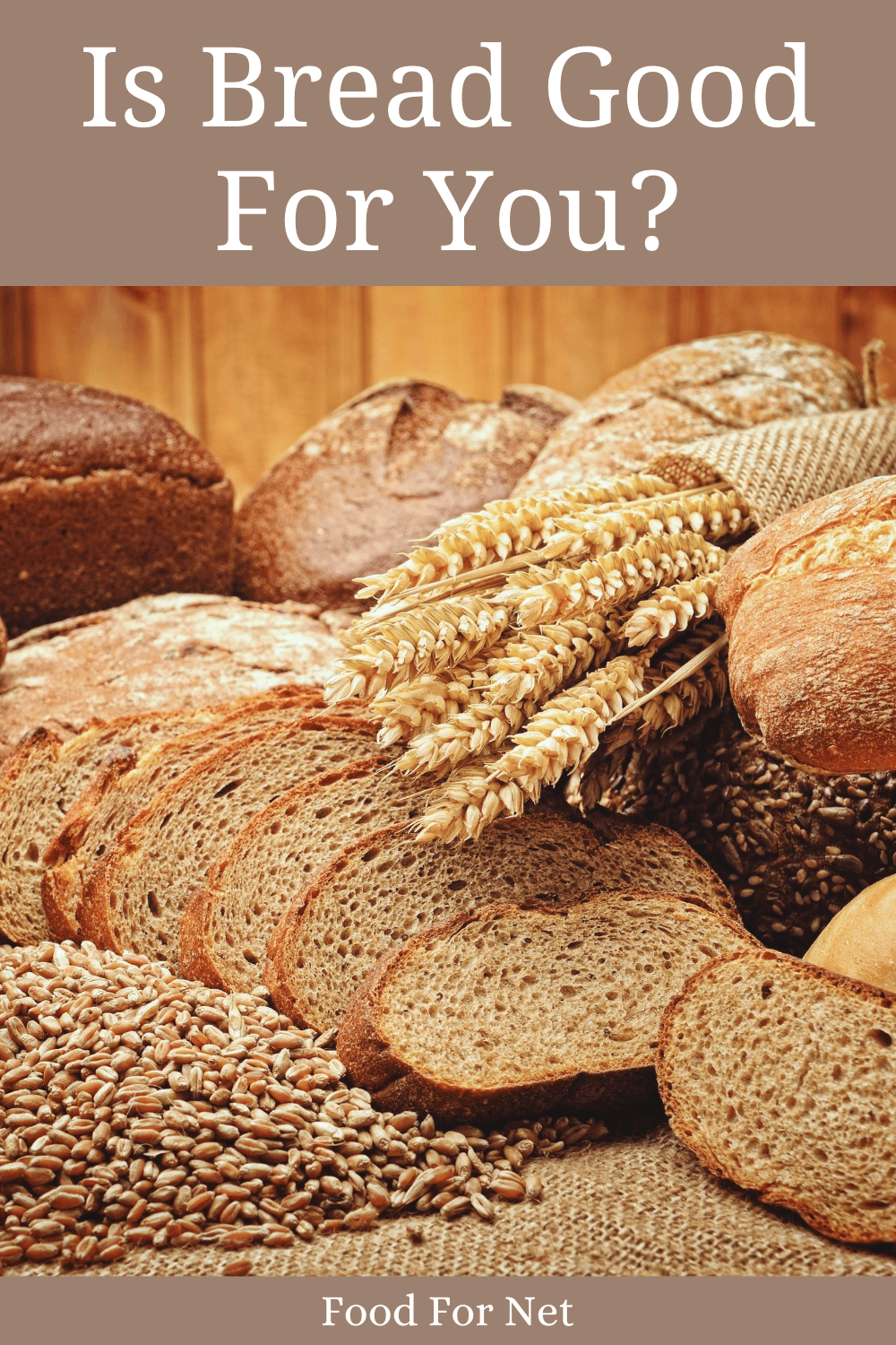 A selection of fresh bread, some of which has been sliced, along with some wheat, looking at whether bread is good for you