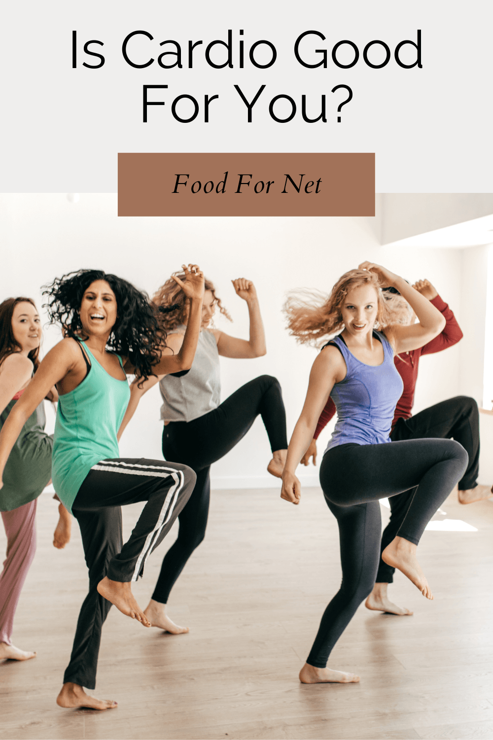 A group of women exercising in a studio, working on cardio, as an illustration of whether cardio is good for you