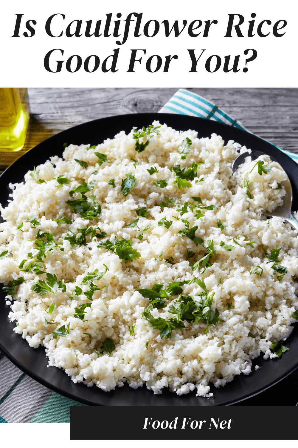 A black bowl of cauliflower rice with a green garnish, looking at whether cauliflower rice is good for you