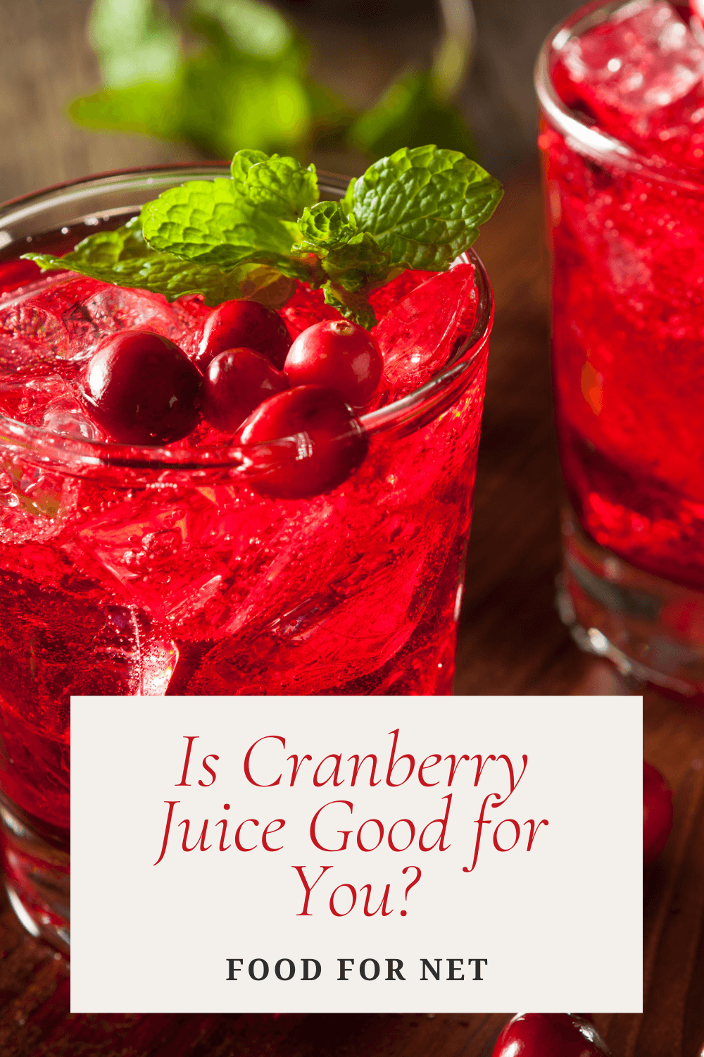 Is Cranberry Juice Good For You? Two glasses of cranberry juice with ice and fresh cranberries