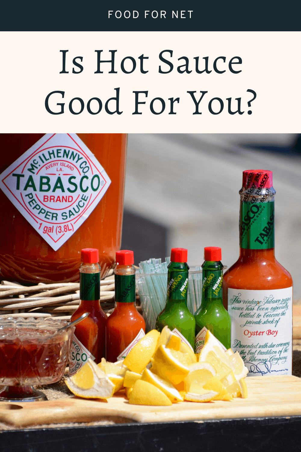 Four small bottles of hot sauce and two larger ones on a table with food, looking at whether hot sauce is good for you