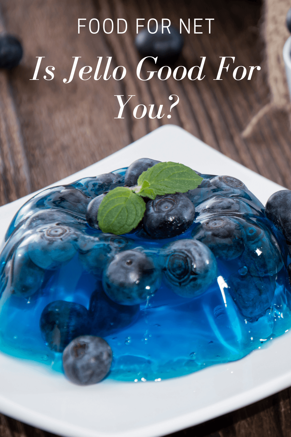 Is Jello Good For You? A white plate with blue jello that contains blueberries