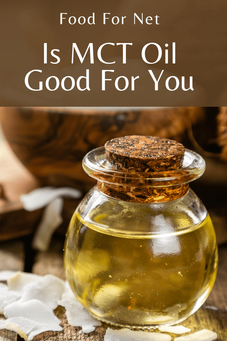 Is MCT Oil Good For You? A jar of MCT oil with a brown bowl of coconut oil behind it