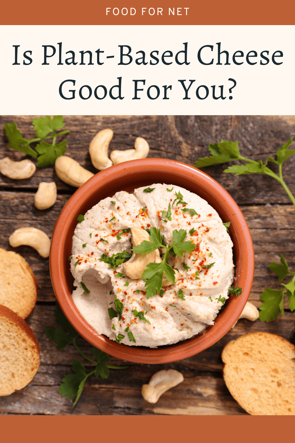 Plant-Based Cheese Good For You? A light brown bowl of vegan cashew cheese, surrounded by crackers and cashews