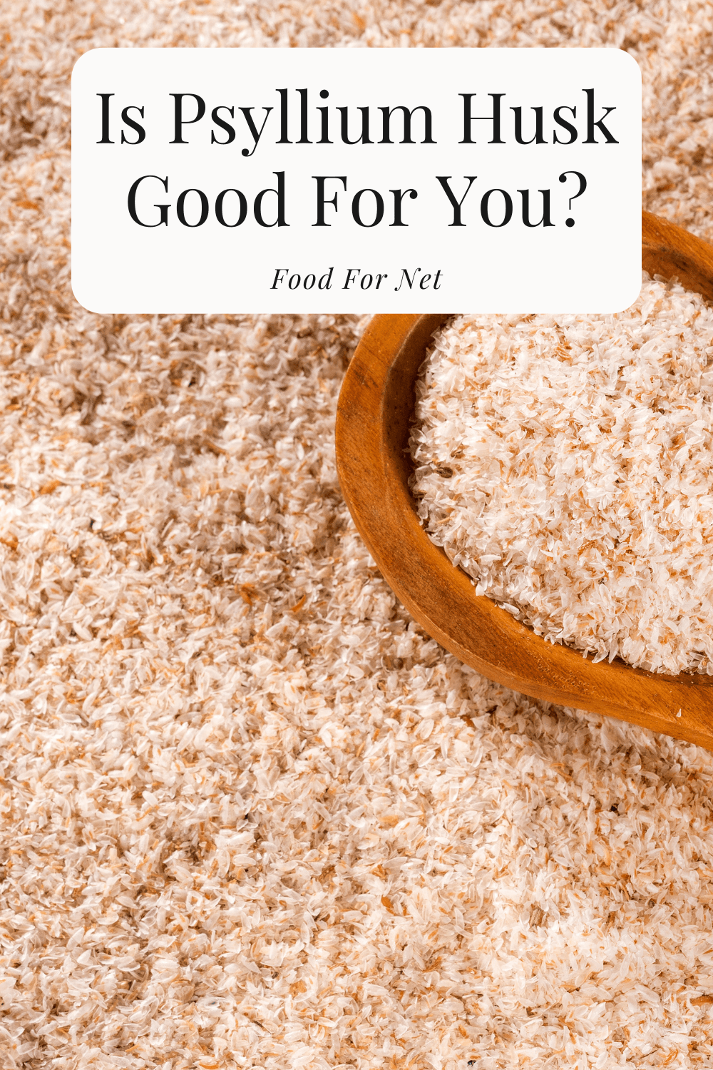 A pile of psyllium husk on a table, with a wooden spoon, looking at whether psyllium husk is good for you