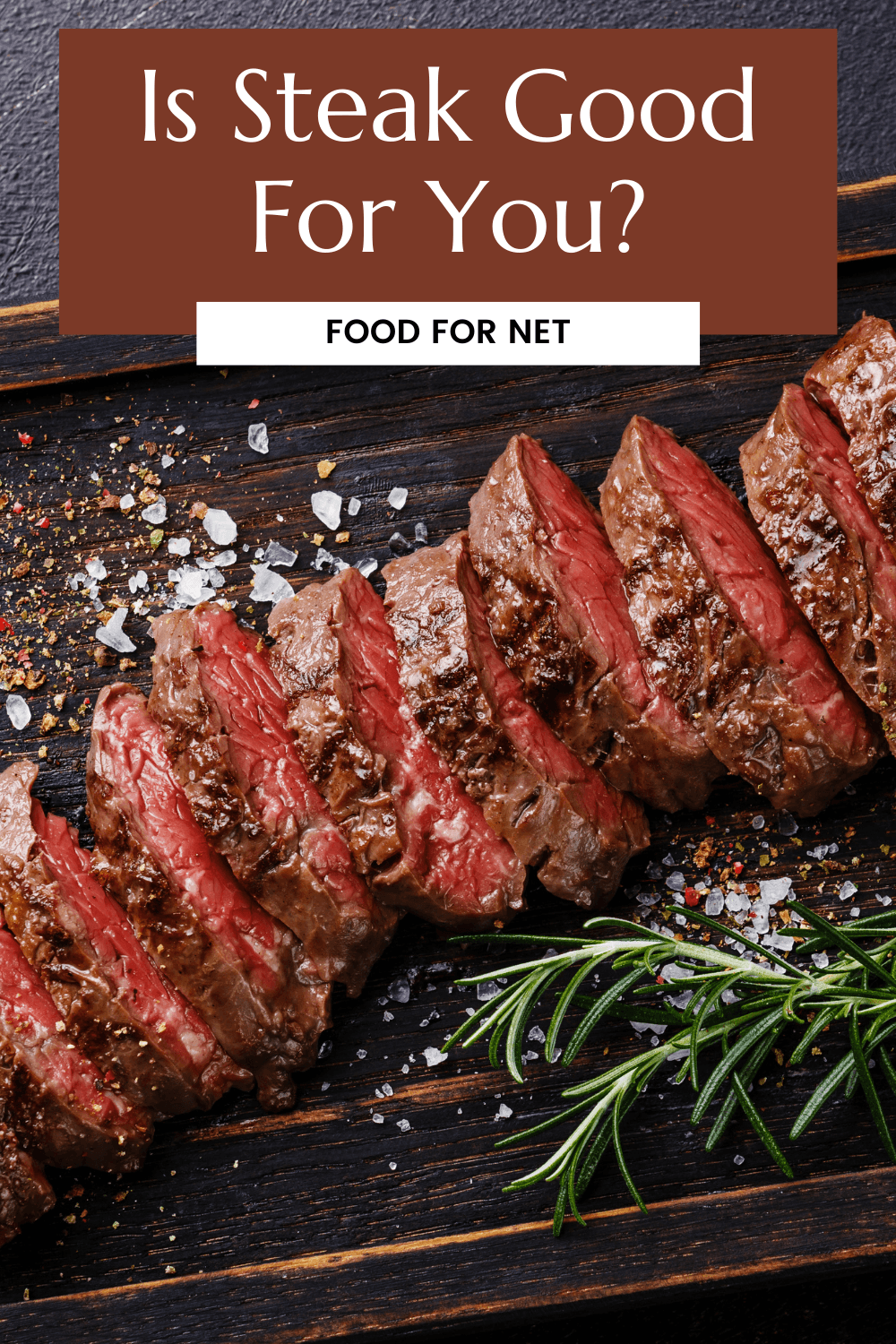 A wooden board with rare steak that has been thinly sliced, asking whether steak is good for you