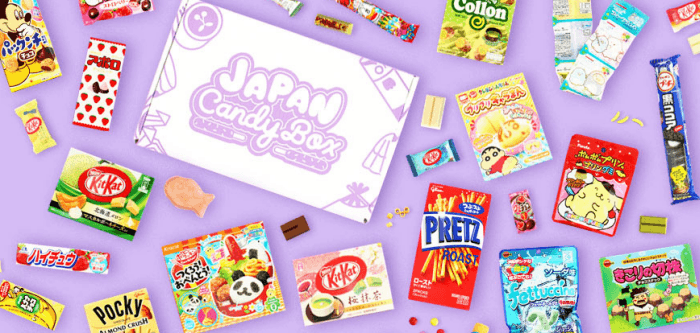 Selection of Japanese candies and a box against a purple background