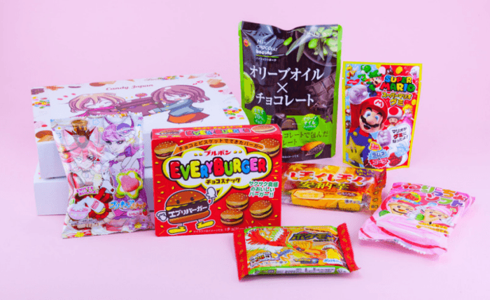 A selection of sweets against a pink background