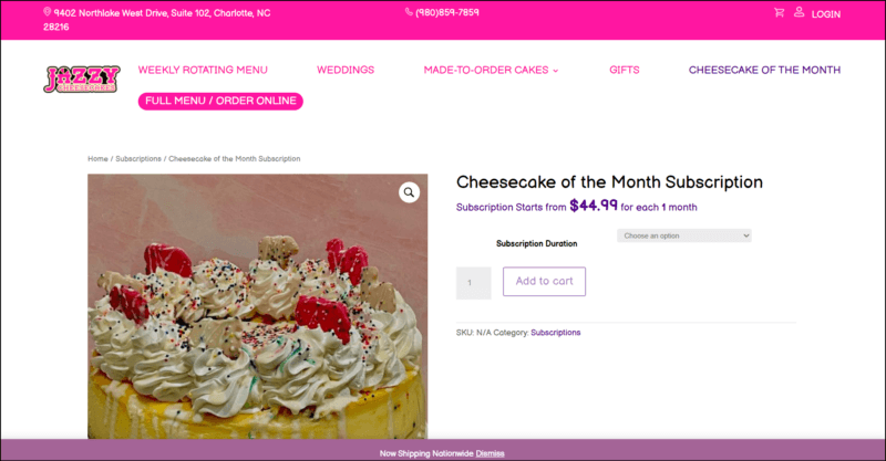 screenshot of Jazzy Cheesecakes Cheesecake of the Month Subscription's web page, dominantly white page with a pink banner on top followed by the website's name along with the main menu, the page displays the information about the cheesecake subscription accompanied by a closeup image of a cheesecake, at the bottom is a lavender announcement bar.