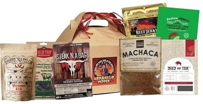 An image showing various bags of jerky and a box from the Jerky of the Month Club