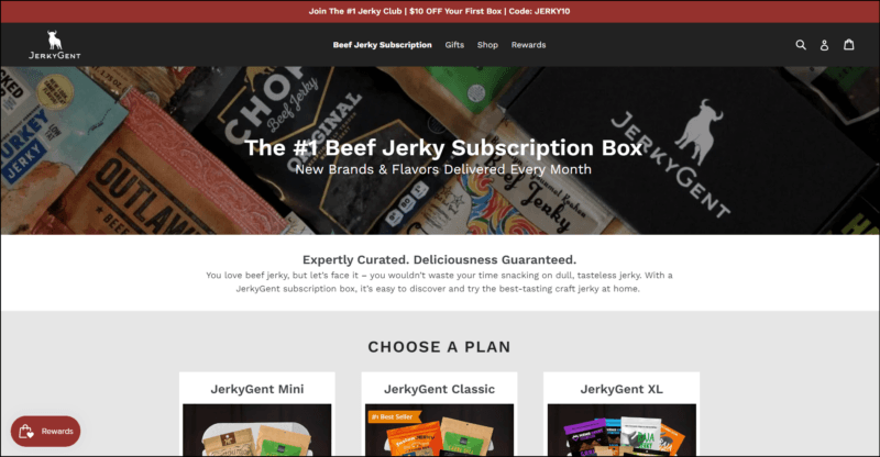 screenshot of JerkyGent Beef Jerky Subscription Box's web page with maroon announcement bar on top followed by a black header with the website's logo and navigation menu, underneath it is an image banner with text overlay, the main content area shows the different jerky club subscription with accompanying images of jerky products