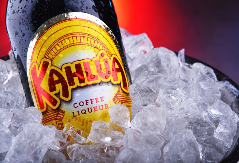 A bottle of Kahlua liqueur on ice