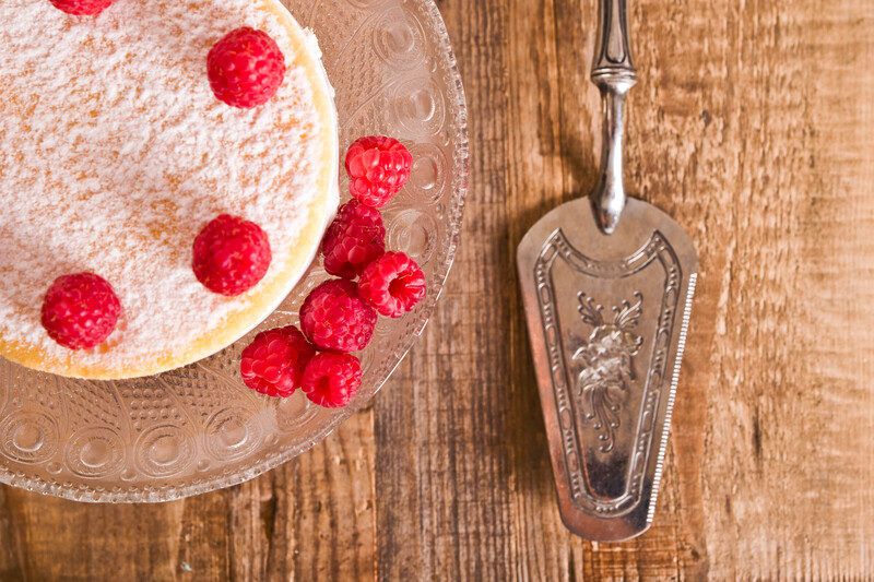 Keto Cheesecake Recipe | Food For Net small cheesecake dusted with keto sugar and fresh raspberries on top