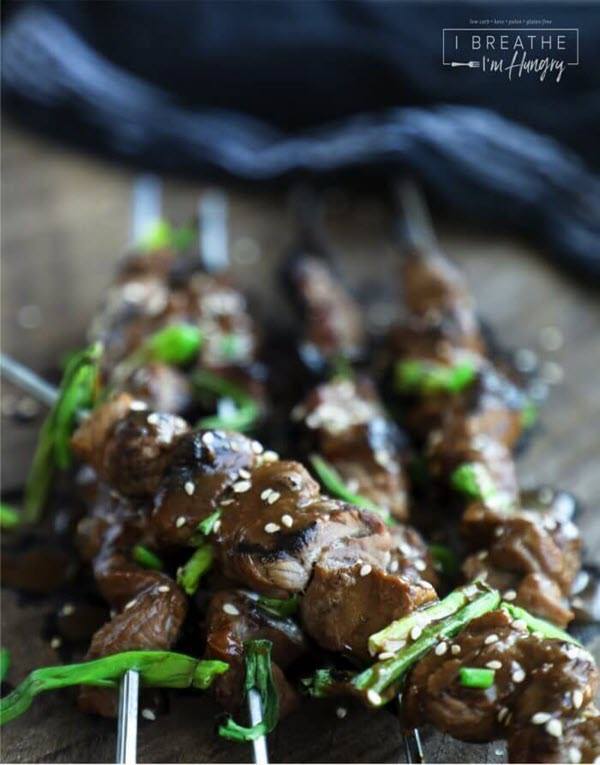 Beef teriyaki on skewers with scallions