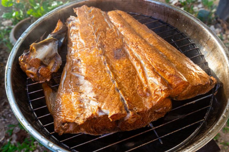 A fillet of King mackerel on a grill