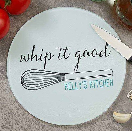 Kitchen-Puns-Round-Glass-Cutting-Board | Food For Net Round cutting board showing a whisk and the phrase Whip It Good