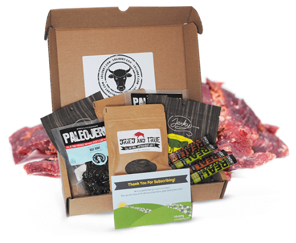 A cardboard box with various jerky and meats