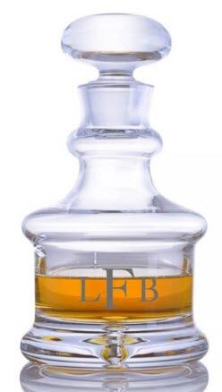 Larchmont Whiskey Decanter | Food For Net A squat decanter with the letters LFB engraved