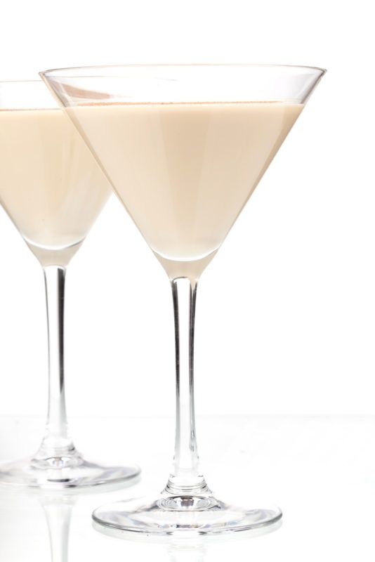 Two cream cocktails in martini glasses