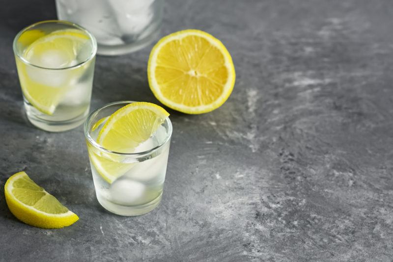 A few lemon drop shots on a table