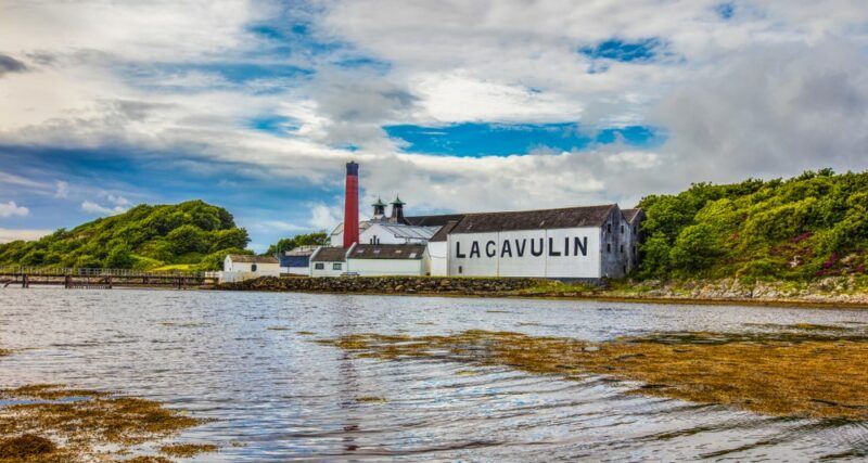 Looking across a lake at the Lagavulin distillery