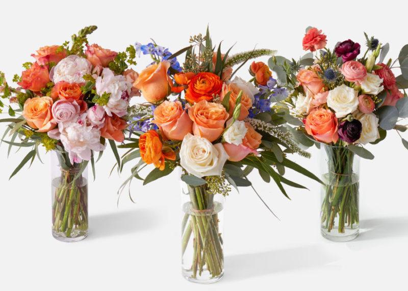 Luxe Subscription from Urban Stems showing three bouquets of flowers in glass vases