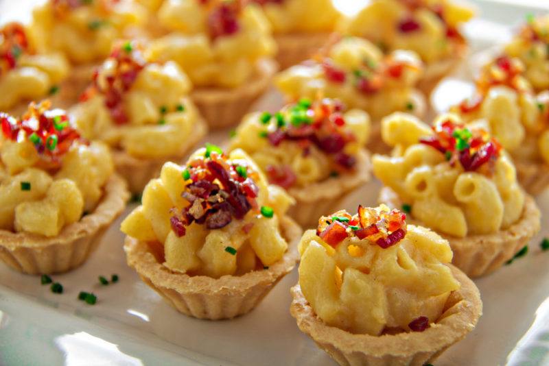 A selection of macaroni cheese bites in pastry shells