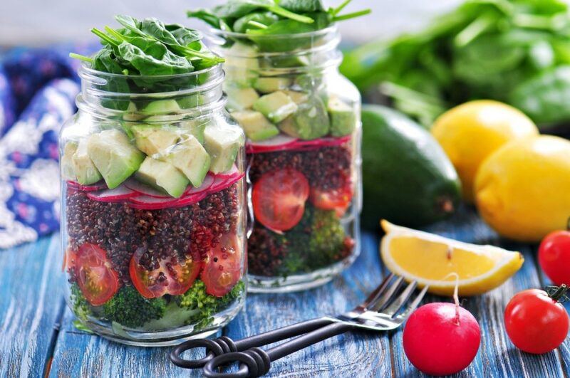 Two quinoa salads made in mason jars