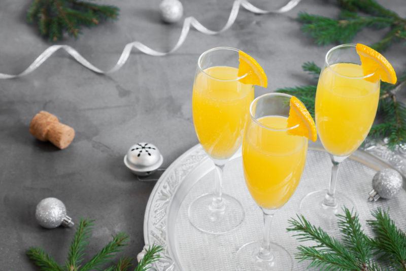 Three mimosas on a silver tray