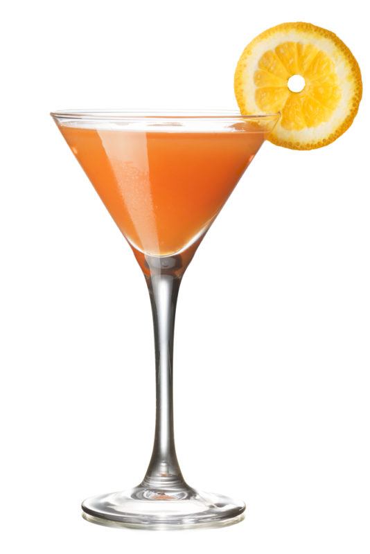 An orange Monkey Gland cocktail with an orange slice