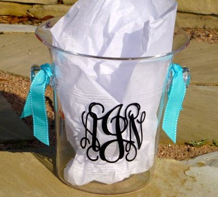 Monogram Wine Cooler | Food For Net An acrylic bucket with black text and blue ribbons.