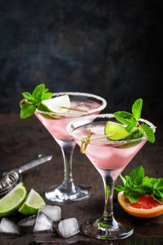 Two grapefruit cocktails in martini glasses