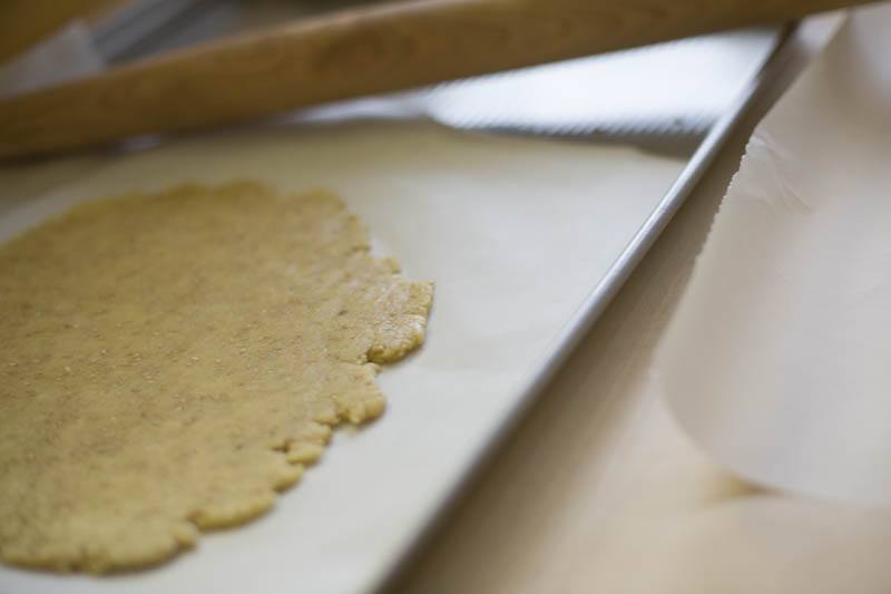 Using a rolling pin, divide the dough in two or three pieces