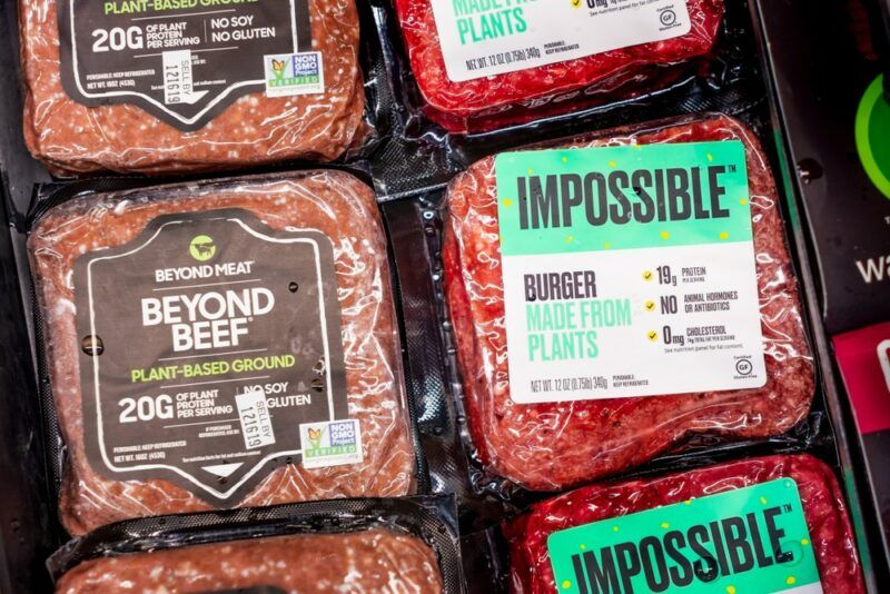 Packages of Impossible and Beyond Beef mince in a grocery store