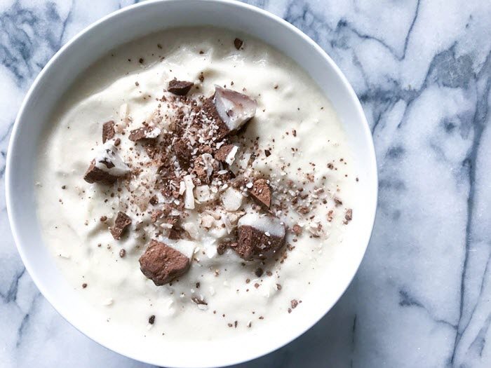 Paleo Keto Vanilla “Milkshake” Smoothie | Food For Net A topdown image of a vanilla shake with chocolate