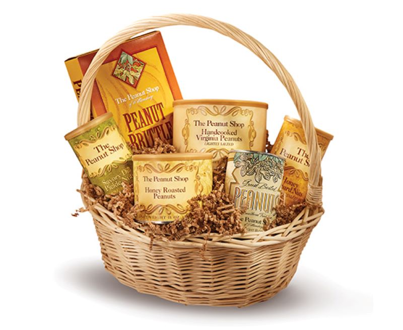 Basket of various peanuts, a box of peanut brittle, 5 canisters of peanuts