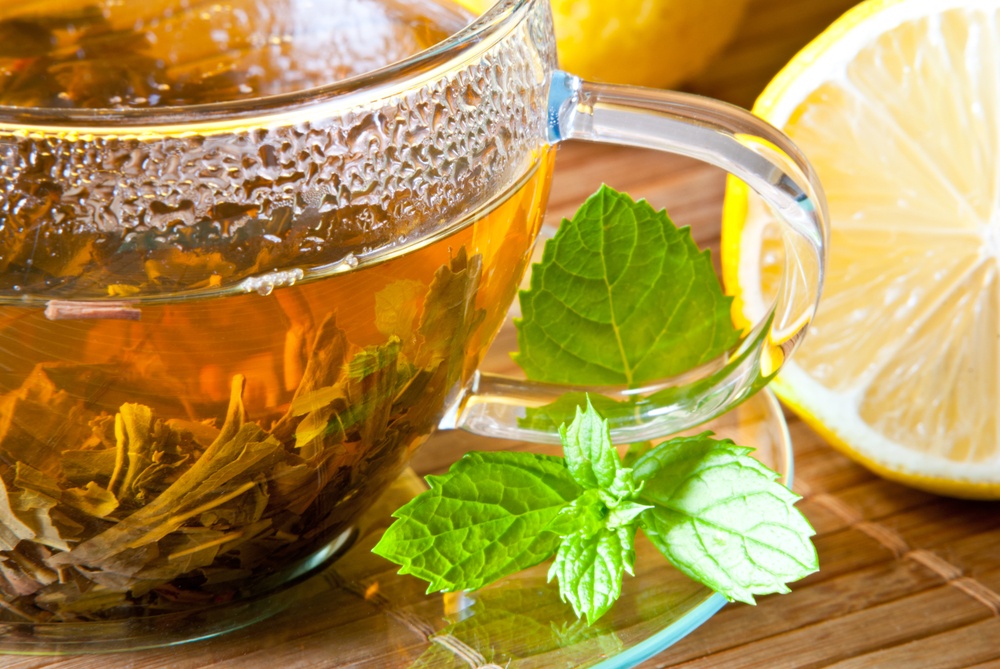 A glass jug of peppermint tea