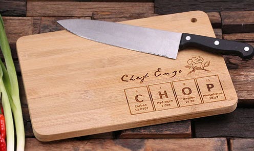 Periodic-Table-Chopping-Board | Food For Net Cutting board and a knife, with the letters CHOP engraved onto the board.