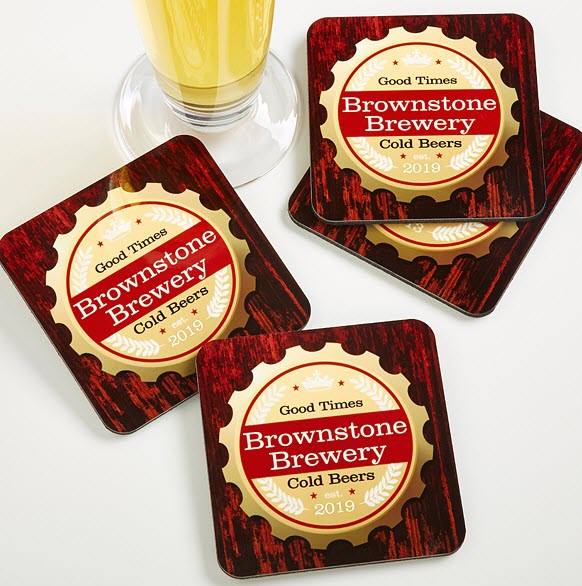 Selection of 4 customized beer coasters, along with the bottom of a glass of beer. 