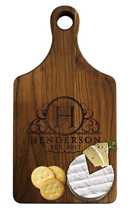 Personalized-Cheese-Maple-Walnut-Cutting-Or-Serving-Board | Food For Net A paddle cutting board with cheese and crackers.