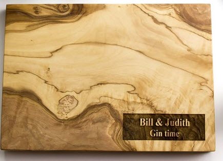 Personalized-Olive-Wood-Chopping-Board | Food For Net Marbled cutting board with Gin Time engraved upon it.
