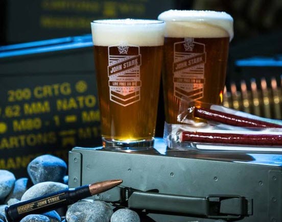 Two pint glasses, jerky and a bullet bottle opener along with some ammo cans. 