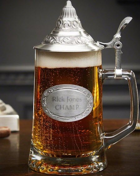 Customized beer stein with a silver metallic top and medal in the center.