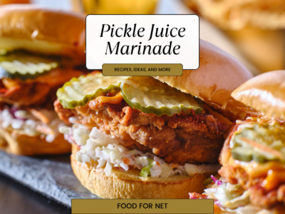 A line of chicken burgers that have been made using pickle juice marinade, salad, and pickles.