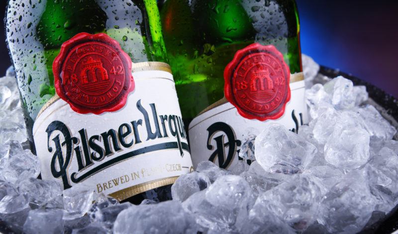 Two bottles of Pilsner with ice