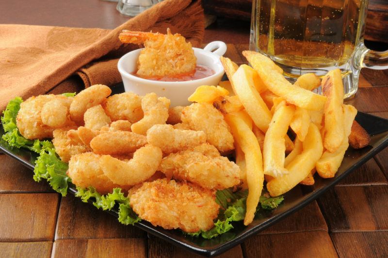 Popcorn and coconut shrimp with fried chips